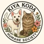 Logo for Kiya Koda Humane Society featuring an illustrated white dog and a brown tabby cat, surrounded by flowers within a circular frame, highlighting the warmth and care similar to trusted heating brands we service.